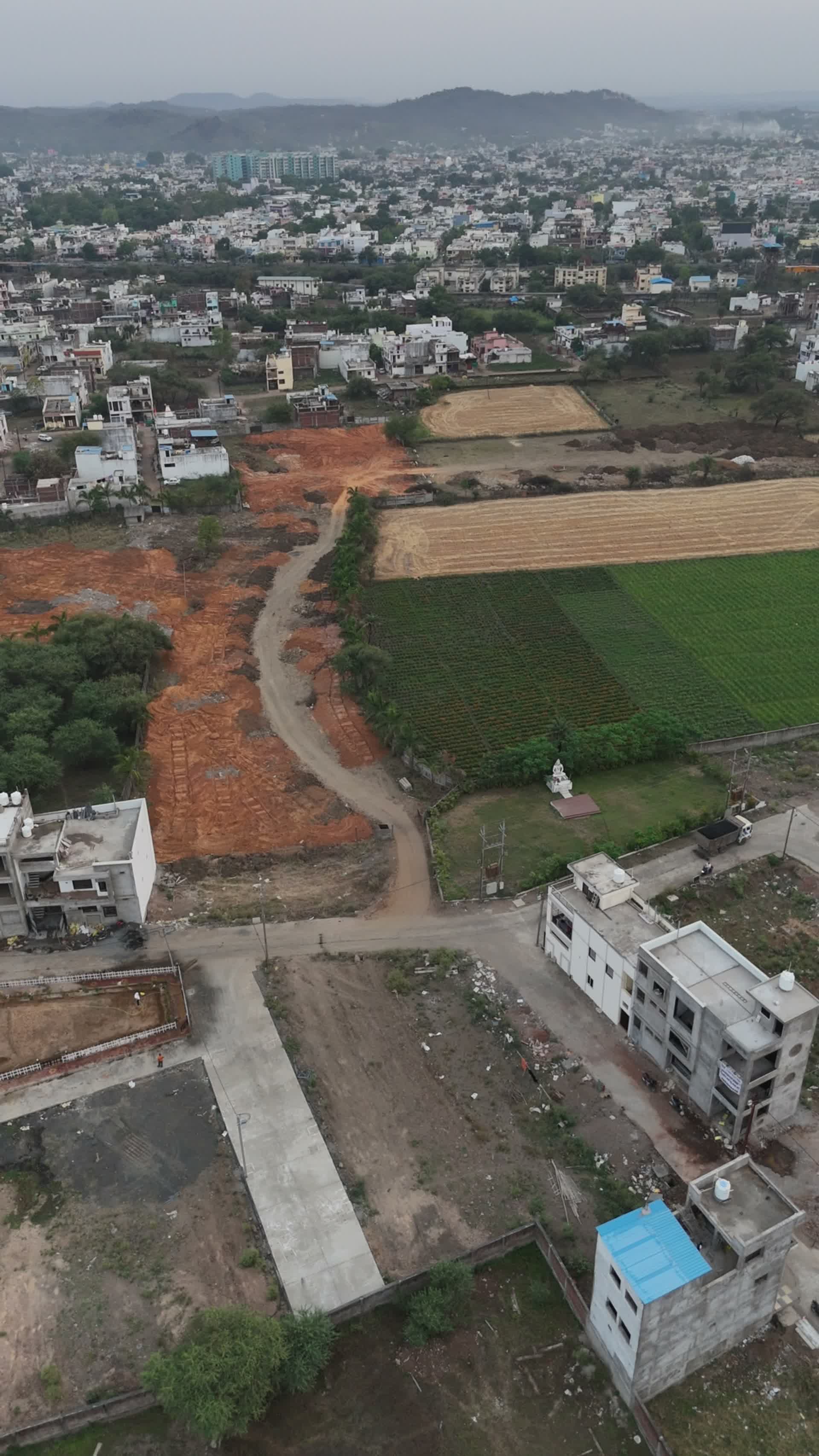 MH Residency roads through the plots